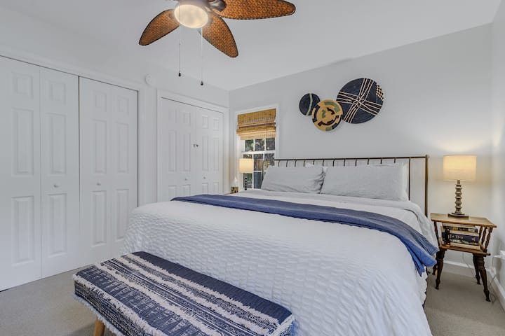 Primary Bedroom with king size bed, storage and attached full bath!