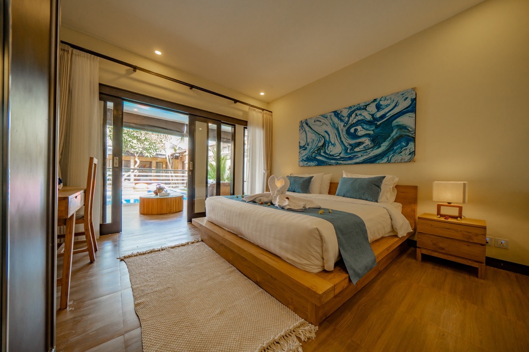 Proximity to paradise: bedroom #2, just a step away from the vibrant living room scene