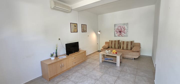 Apartamento 1 planta baja, sala de estar.