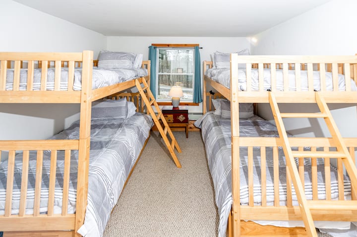 Welcome to Kids Room #1, featuring two cozy twin bunk beds for a fun and comfortable stay.