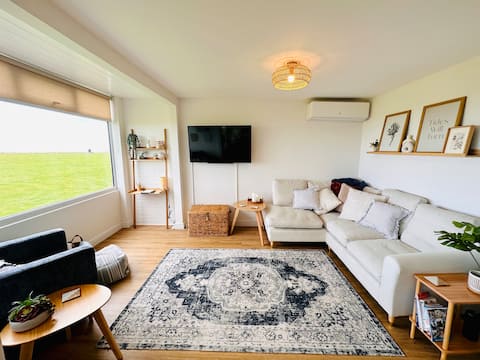 Top performing Airbnb: Stunning clifftop chalet with sea view in North Norfolk