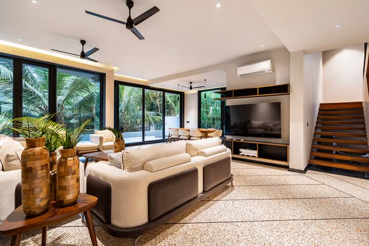 A sleek living room with contemporary furnishings and premium amenities
