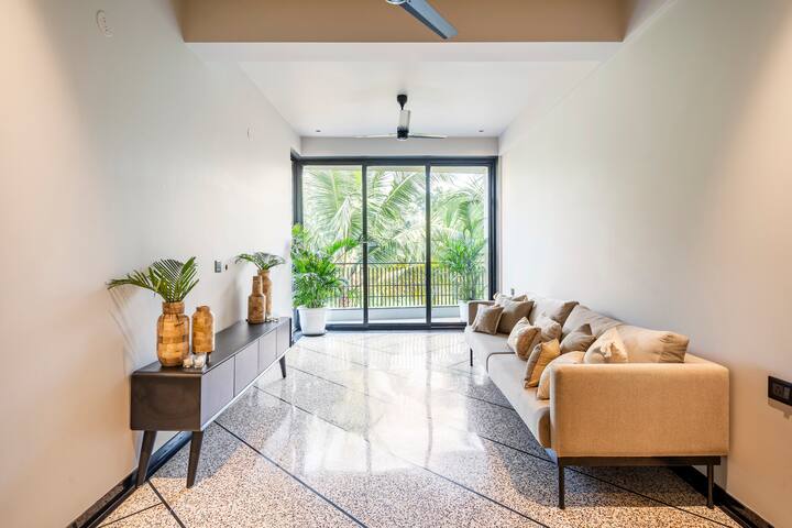Natural light floods this cozy space, creating a cheerful and relaxing ambiance