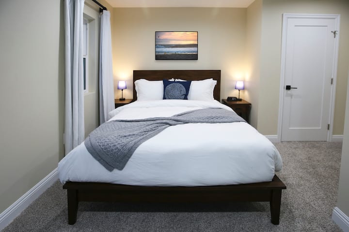Bedroom 3: Pottery Barn queen bed, Parachute linens and blackout curtains
Balcony to the right through sliding glass door.
Pottery Barn console table features make up mirror and seating.

Closet has 2 luggage racks and some hangars included.

