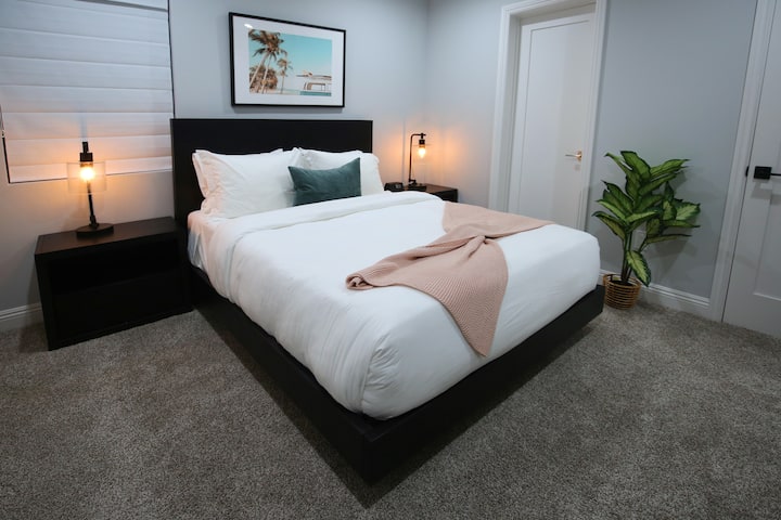 Bedroom 2: Pottery Barn Queen bed, Parachute linens , blackout roller shade. Closet has some hangars included as well as 2 luggage racks.  