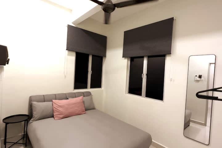 "Comfortable Stay for All: Second Bedroom Offers a Cozy Queen Bed for a Restful Night's Sleep!"