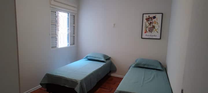 bedroom with 2 beds and 2 extra beds below