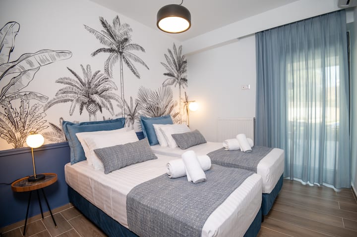 two of the three bedrooms offer two single beds that can be turned into a large double bed if requested. 

The sofa can be used as a bed.