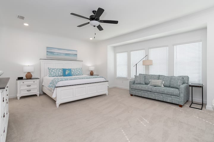 Primary Bedroom with King Bed and Pull Out Couch