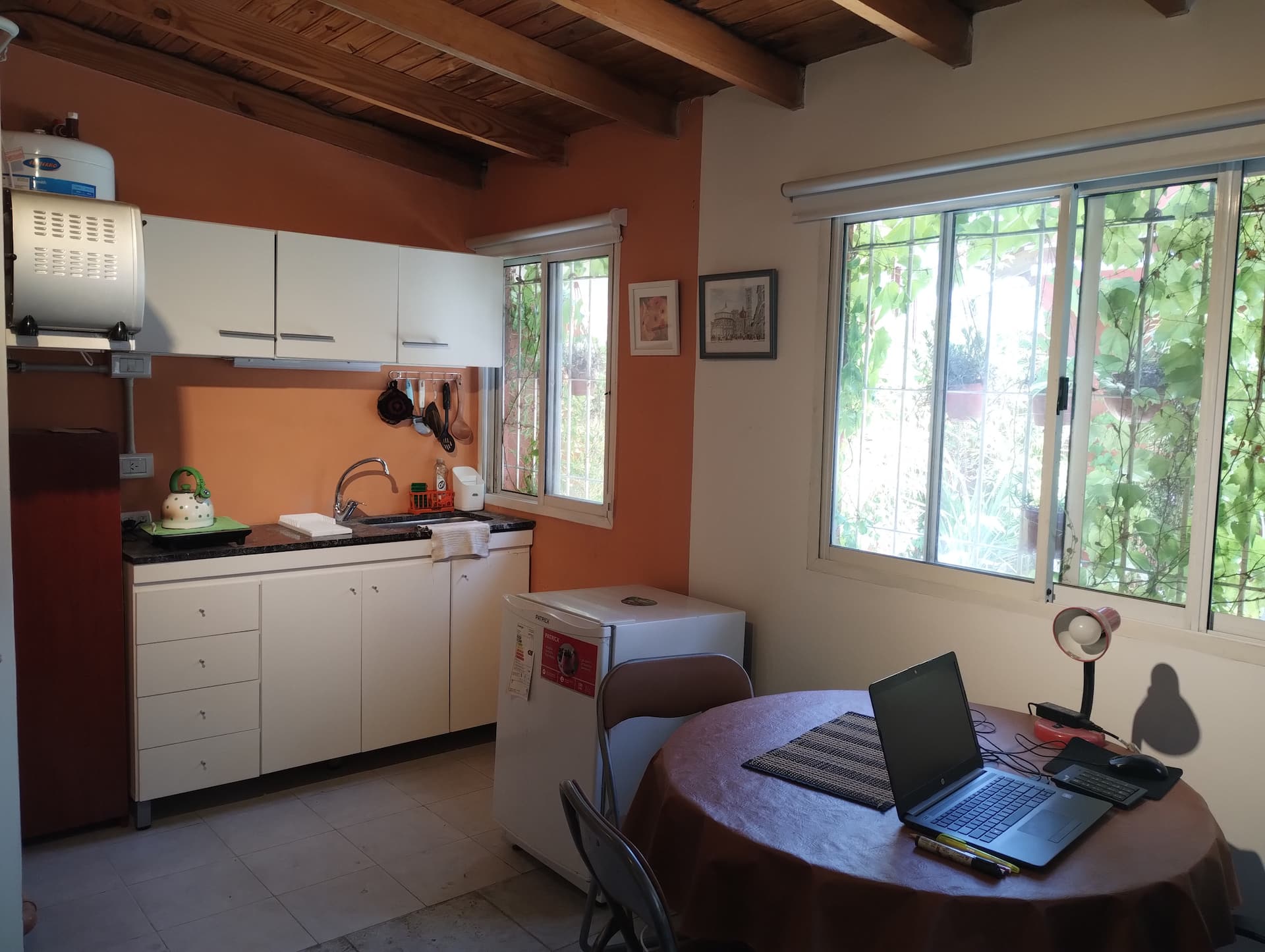 A bright studio with a patio