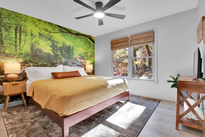 King size bed directly across from the hall bathroom.