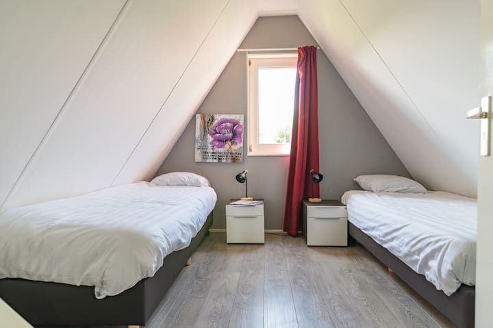 Bedroom 3 on the 2nd floor with 2 separate box springs that can be placed next to each other on request

Cabinet space is located at the landing