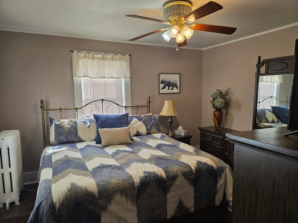 King suite, one of 8 comfortable bedrooms - 3 with private baths - space and privacy for 16+ guests.