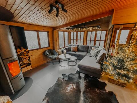 Chalet typical of the Ardennes in the forest.