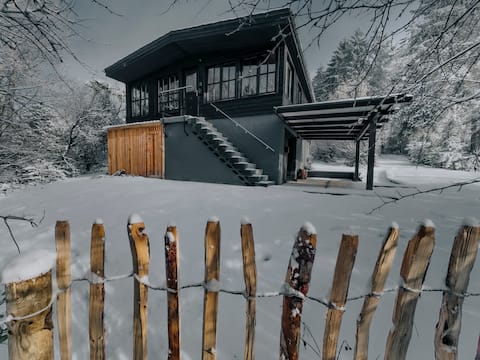 Typical Ardennes cottage in the forest.