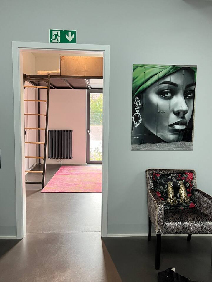 Room with a high bed in event location Apartments for Rent in Hamburg