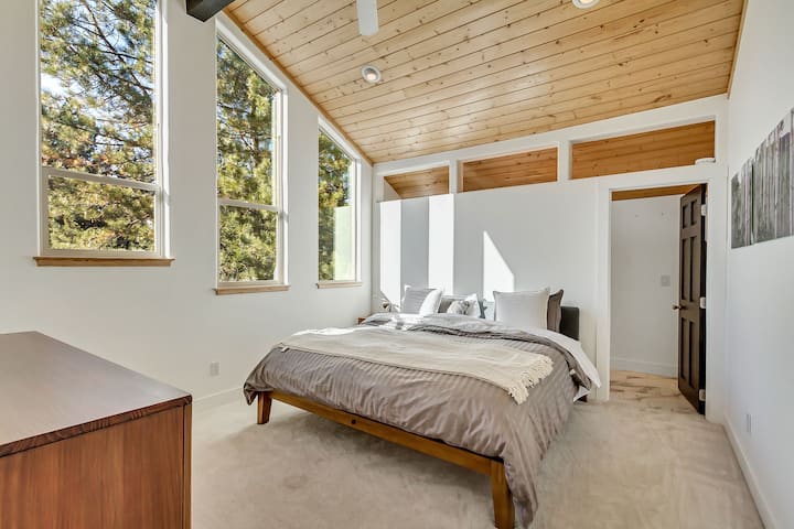 Master Bedroom with King bed and cathedral window views of Park City Canyons Mountain