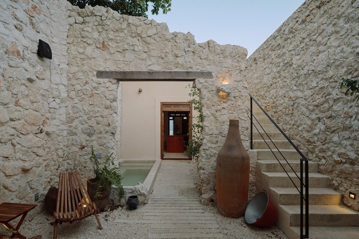 Casa Muralla — rooftop terrace looking over the ancient city wall toward the Gulf — Casonas MX, Campeche, Mexico