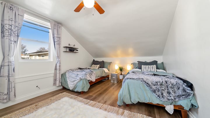 1st Bedroom, 2 Twin Beds, Big Window, Ceiling Fan, Window AC Unit in the Summer