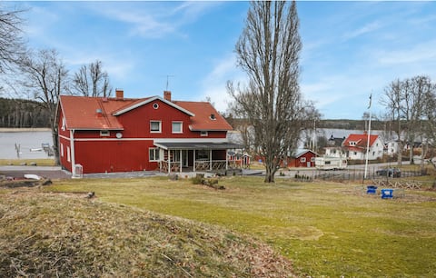 Swedish house with lake view, traditional style