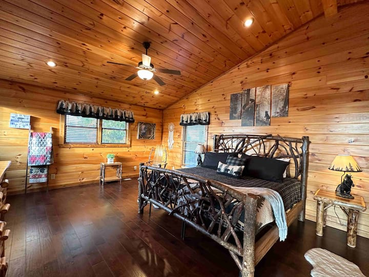 Upstairs primary hosts a comfy custom made King bed.