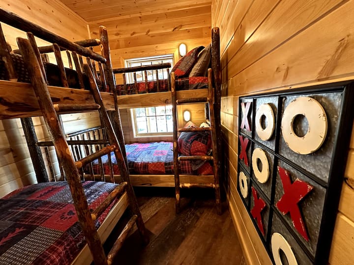 Kids bunkbed room.  Each bunk has its own light and USB/Electrical plugs.
