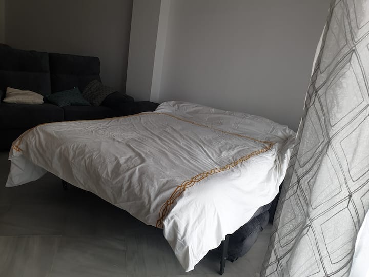 Kitanda cha sofa katika sebule