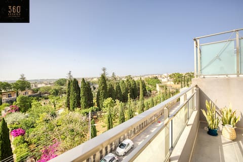 A beautiful penthouse, with lovely greenery views