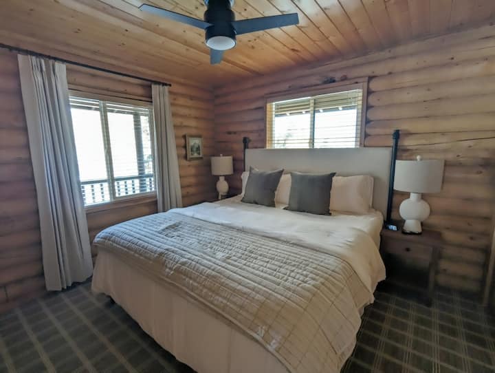 Second guest room on the main floor. Each room has white noise machines and also phone and laptop adaptor units on the nightstands for ease of plugging in by the bed.