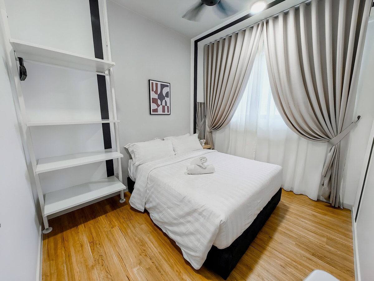 Second room with a great city view, matching design, and an open wardrobe for your convenience