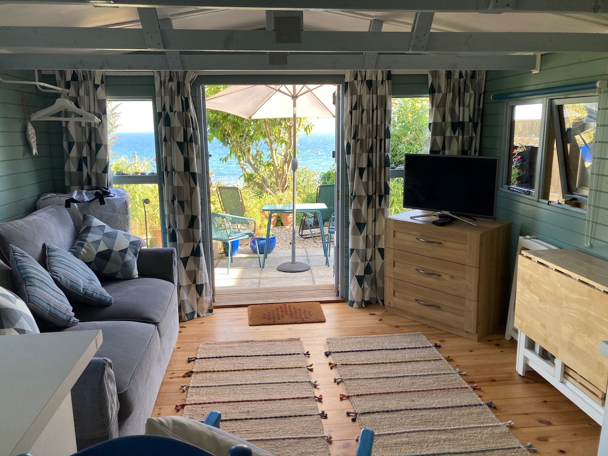 Top Airbnb: Fisherman's Hut above beach with sea views in Lyme Regis