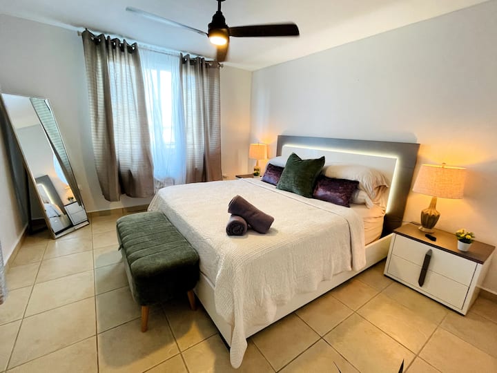 Master retreat with King bed, AC walk in closet and on suit full bathroom.