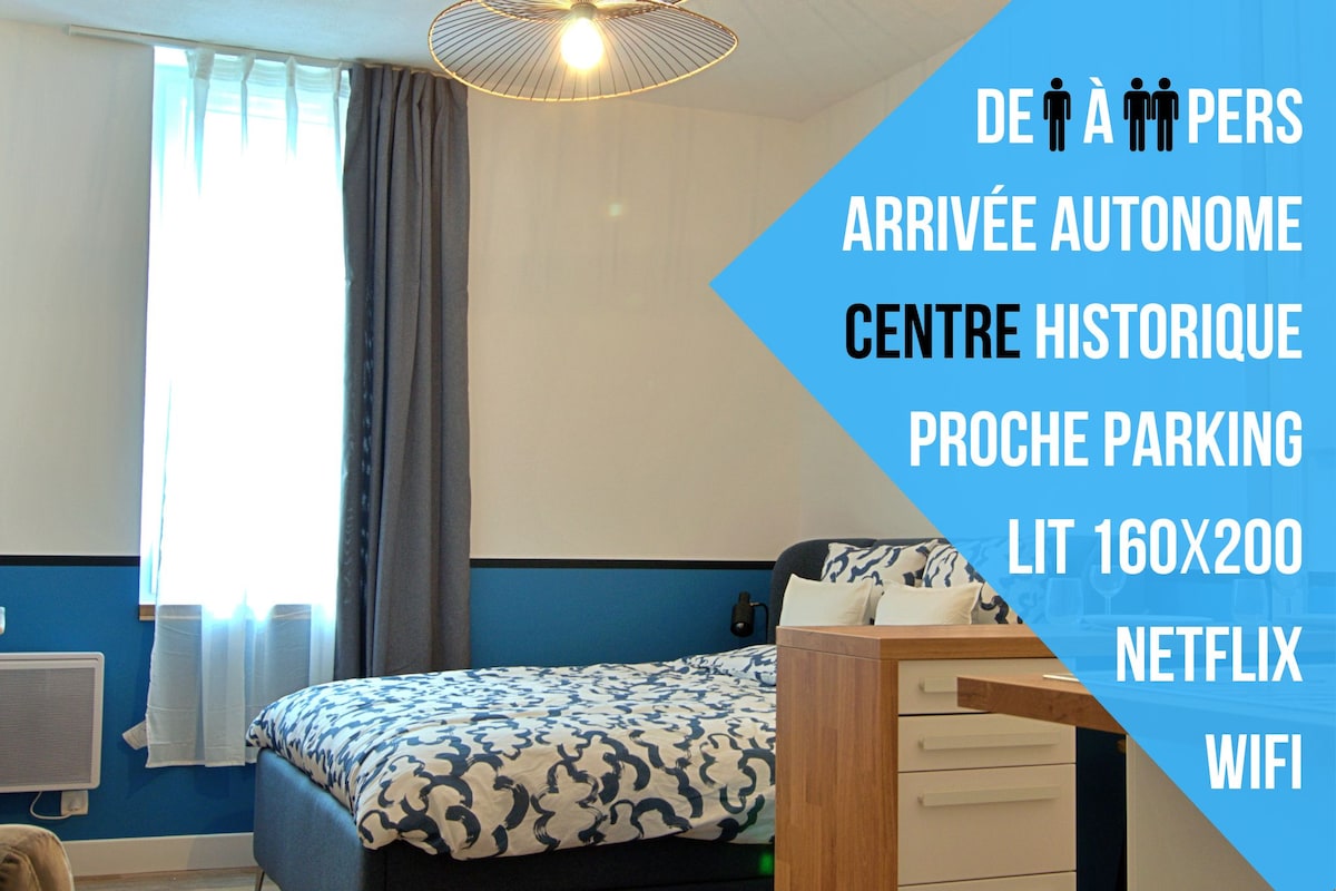 A bright sleeping area is illustrated, featuring a spacious bed adorned with a patterned duvet. Natural light enters through a sheer curtain-covered window. A modern lamp hangs overhead, while a wooden bedside table complements the contemporary decor.