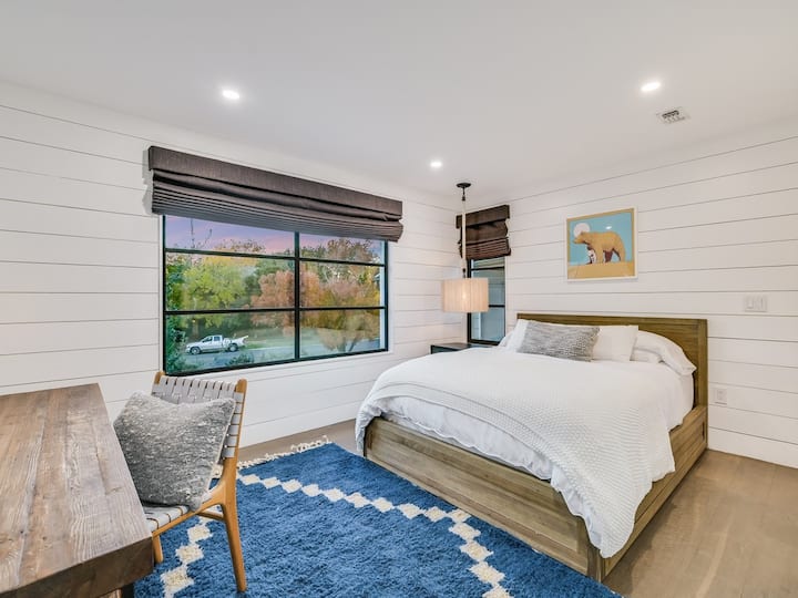 One of two secondary bedrooms in main residence.  Queen size bed and large computer desk.  Full size closet with drawers, shelves, and ample hanging space.