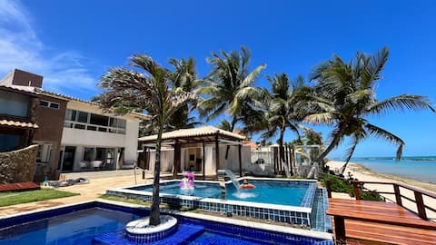 Beach house with swimming pool in Barra de São Miguel