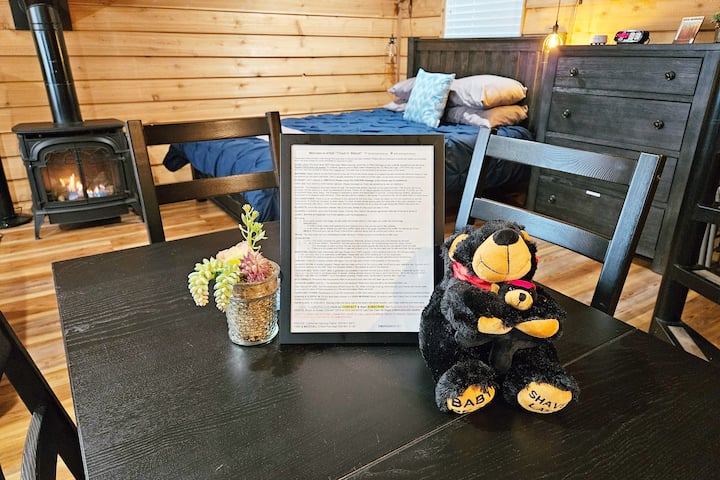 On the table as you enter you will find an 8x11 WELCOME frame. This contains everything from WiFi info to locations of items in the cabin and outside! We recommend reading this thoroughly once you have unpacked!
www.DropMyPin.com
