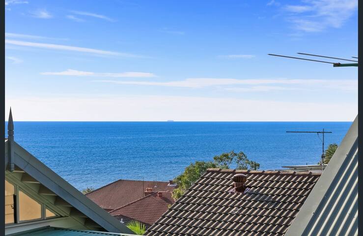 Luxury apartment footsteps from the beach! gallery image 5