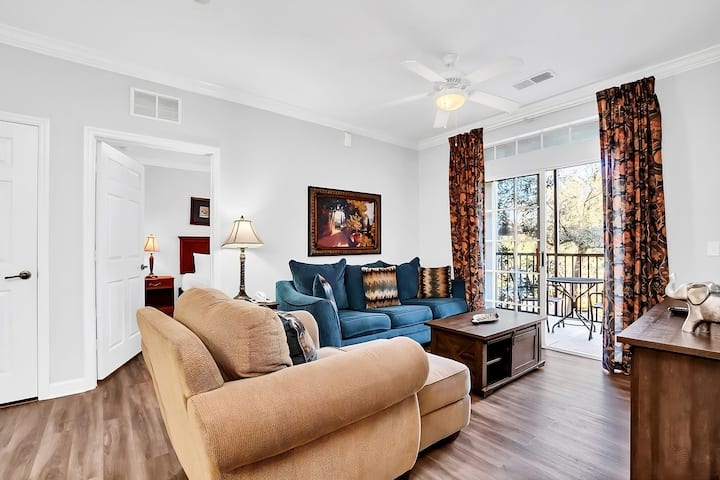 Living room overlooking the Golf course and pond.