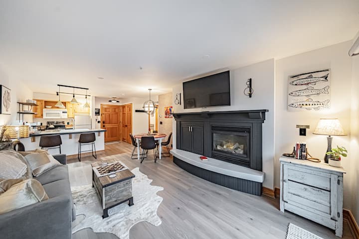 The sheepskin rug and fireplace keeps keep the living room cozy in the winter. 
