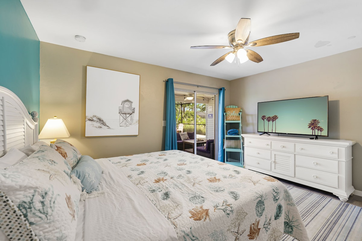 You feel a sense of serenity as you step into the king bedroom, where the elegant design and comfortable bed invite relaxation.