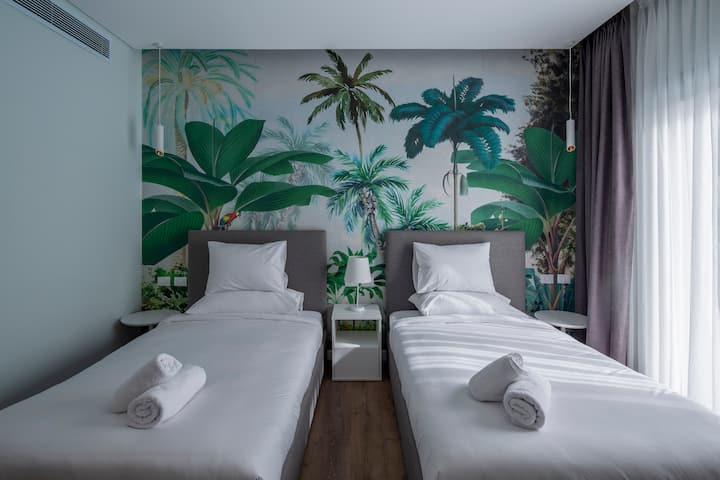 Encantadora habitación con dos camas individuales.