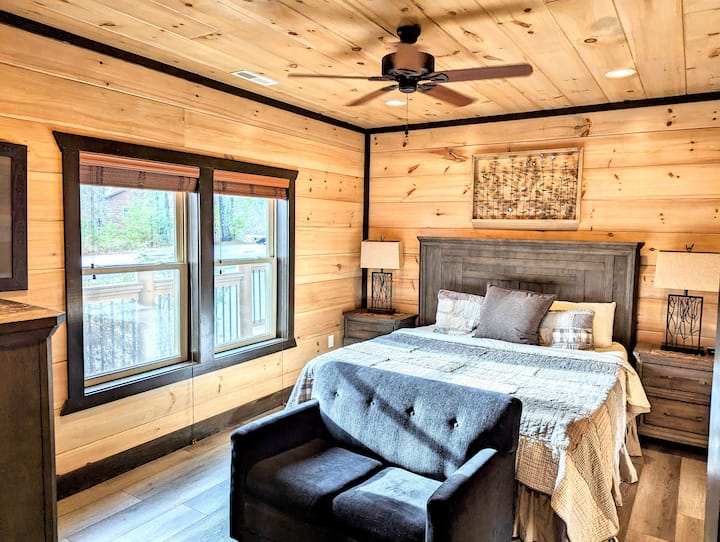 Bedroom 1 with Sofa and TV. 