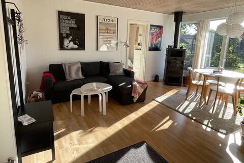 Cozy and central apartment with its own outdoor area.