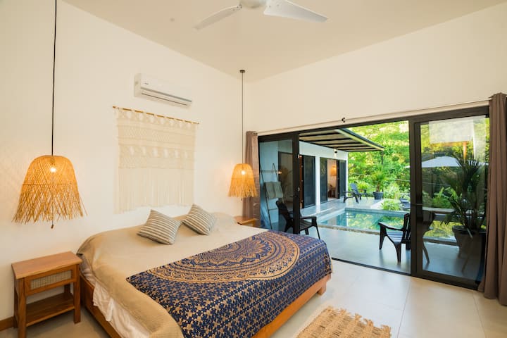This is bedroom #2,  features sleek and stylish furnishings that prioritize comfort without compromising on sophistication. It is generously spacious, offering a stylish retreat that comfortably accommodates up to three people.