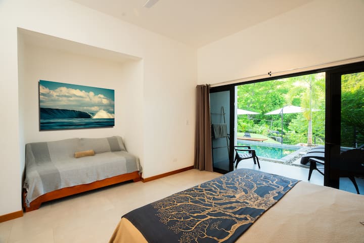This is bedroom #3 generously spacious, offering a stylish retreat that comfortably accommodates up to three people. Whether you're traveling with friends or family, this room ensures that everyone enjoys a relaxing and memorable stay together.