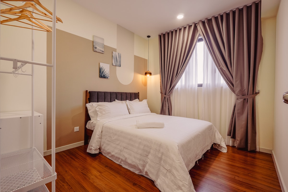 The second bedroom doubles as a perfect workspace, complete with a city view and AC for a comfy work environment!