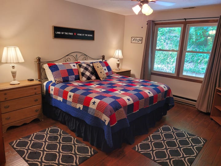 Master bedroom with a King Bed and attached bathroom. Smart TV