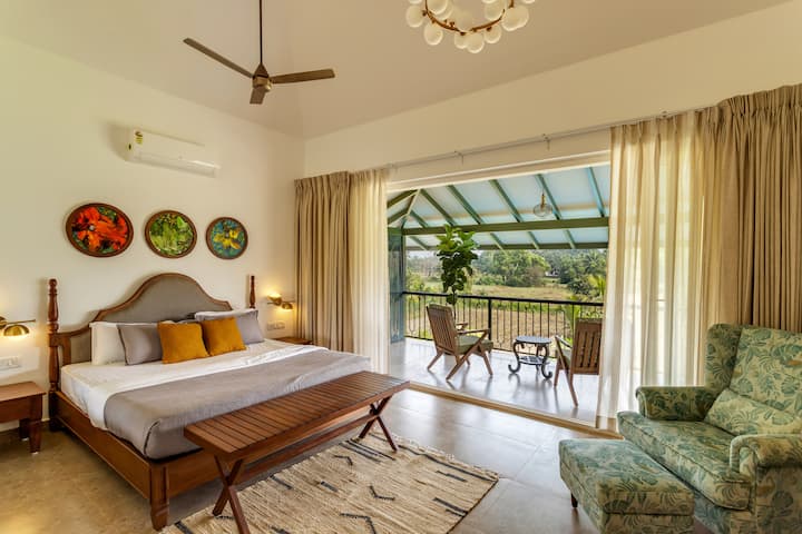 ✨Wake up to golden light and paddy views from this peaceful balcony suite.
Comfort, colour and calm-your Goan escape starts right here✨