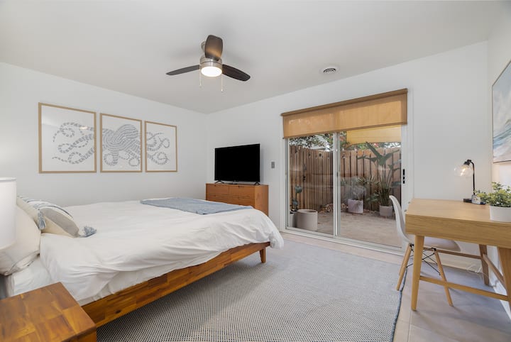 Welcome to the master bedroom.  Enjoy our king size bed, dedicated workspace and patio access. 

North Myrtle Beach - Ocean, Beaches, Pool, Family, Golf, Homes, Condo’s, Private
