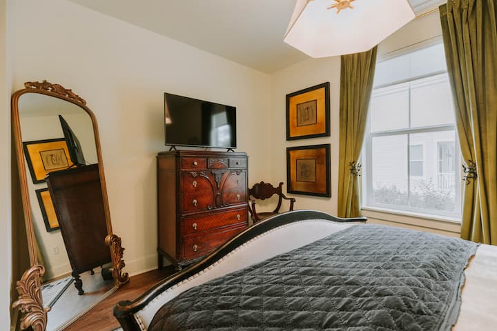 Primary Bedroom with attached full bathroom & Smart TV